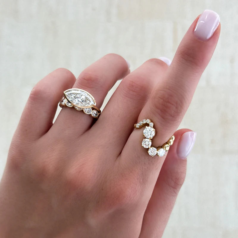 Penumbra Bezel Set Engagement Ring With East West Marquise Cut