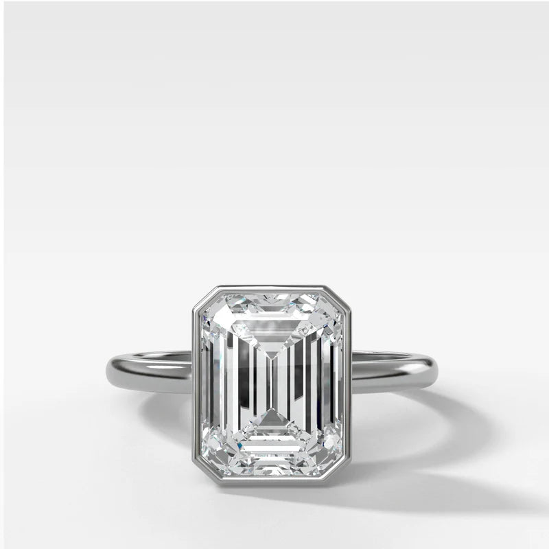 Penumbra Bezel Set Engagement Ring With Emerald Cut