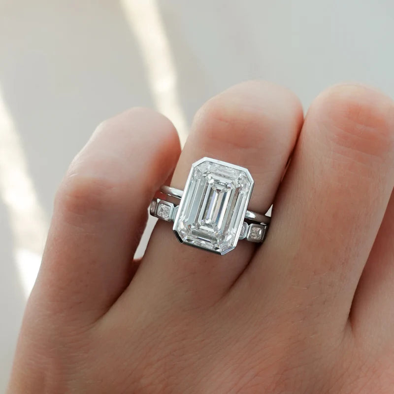 Penumbra Bezel Set Engagement Ring With Emerald Cut