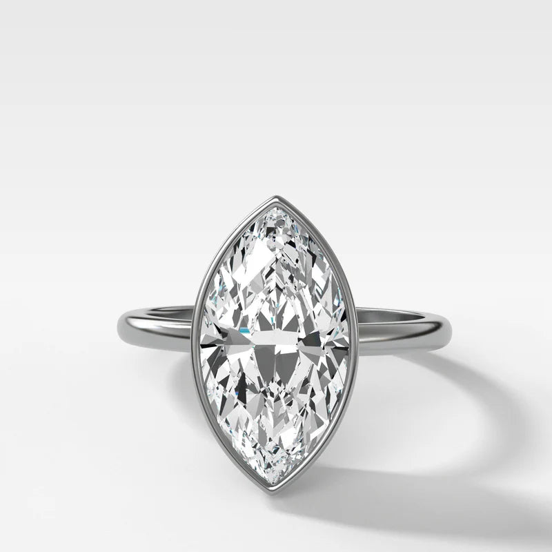 Penumbra Bezel Set Engagement Ring With Marquise Cut