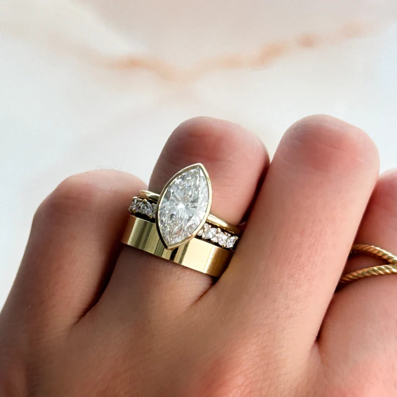 Penumbra Bezel Set Engagement Ring With Marquise Cut