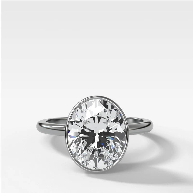 Penumbra Bezel Set Engagement Ring With Oval Cut