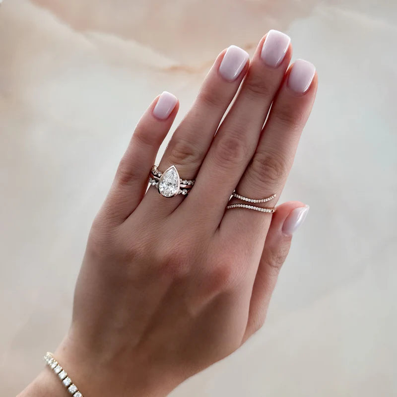 Penumbra Bezel Set Engagement Ring With Pear Cut