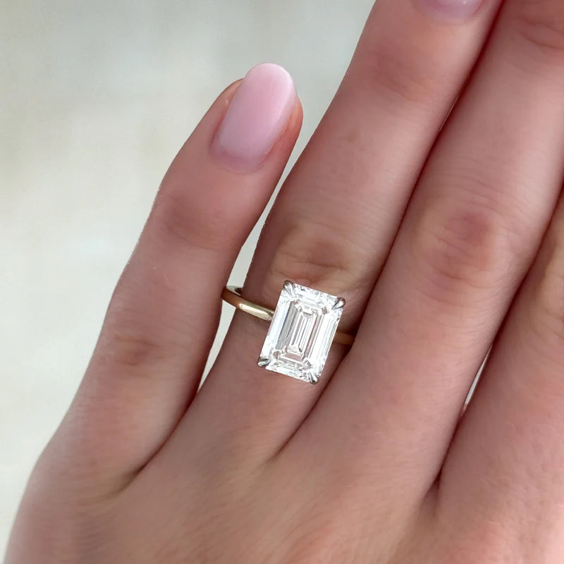 Thin + Simple Solitaire Engagement Ring With North South Emerald Cut Diamond