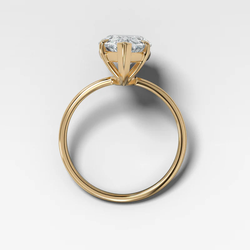 Thin + Simple Solitaire Engagement Ring With North South Emerald Cut Diamond