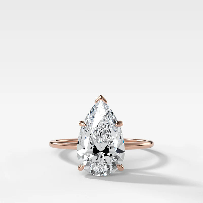 Thin + Simple Solitaire Engagement Ring With North South Emerald Cut Diamond