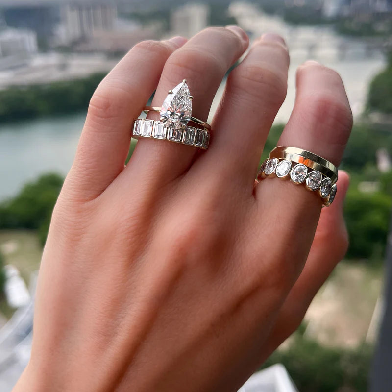Thin + Simple Solitaire Engagement Ring With Pear Cut Diamond