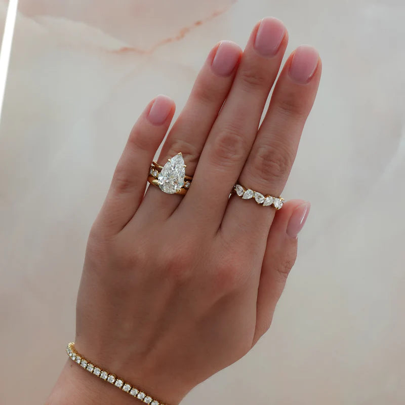 Thin + Simple Solitaire Engagement Ring With North South Emerald Cut Diamond