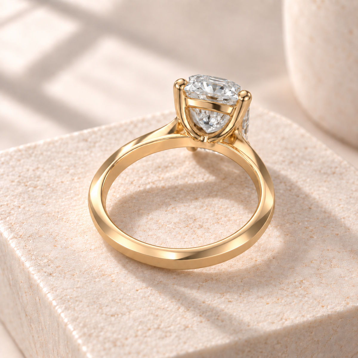 Veyra elongated cushion lab-grown diamond solitaire with a continuous knife-edge yellow gold band, rear design preview