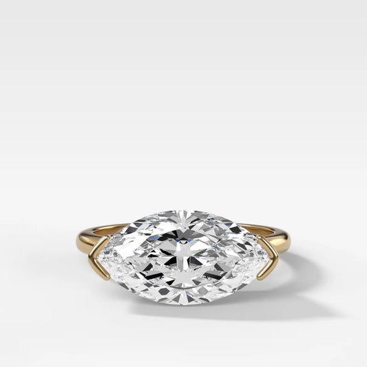 East West Half Bezel Solitaire Engagement Ring With Marquise Cut Diamond