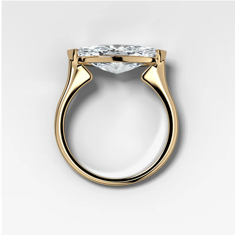 East West Half Bezel Solitaire Engagement Ring With Marquise Cut Diamond