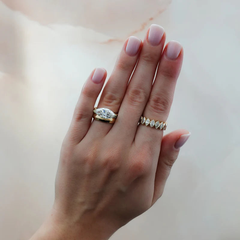 East West Half Bezel Solitaire Engagement Ring With Marquise Cut Diamond