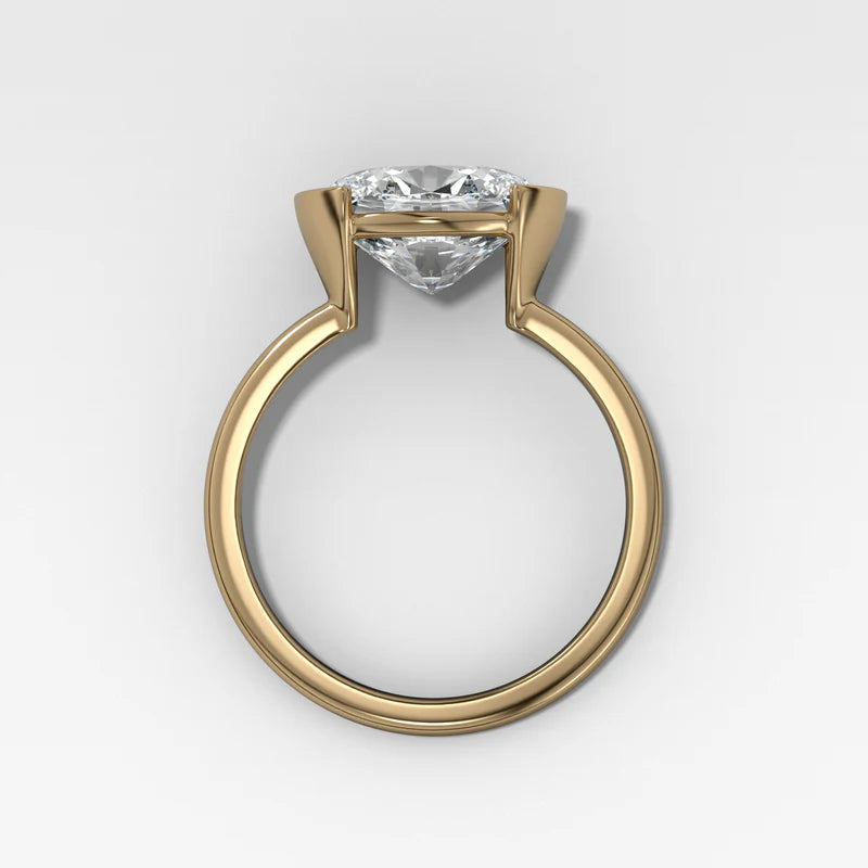 East West Half Bezel Solitaire Engagement Ring With Oval Cut Diamond