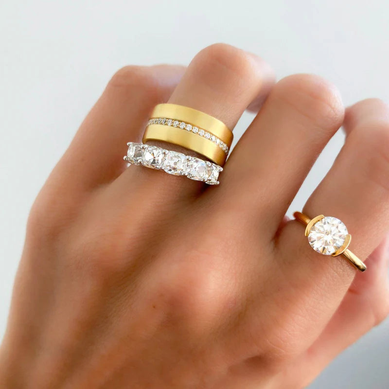 Half Bezel Solitaire Engagement Ring With Round Cut Diamond