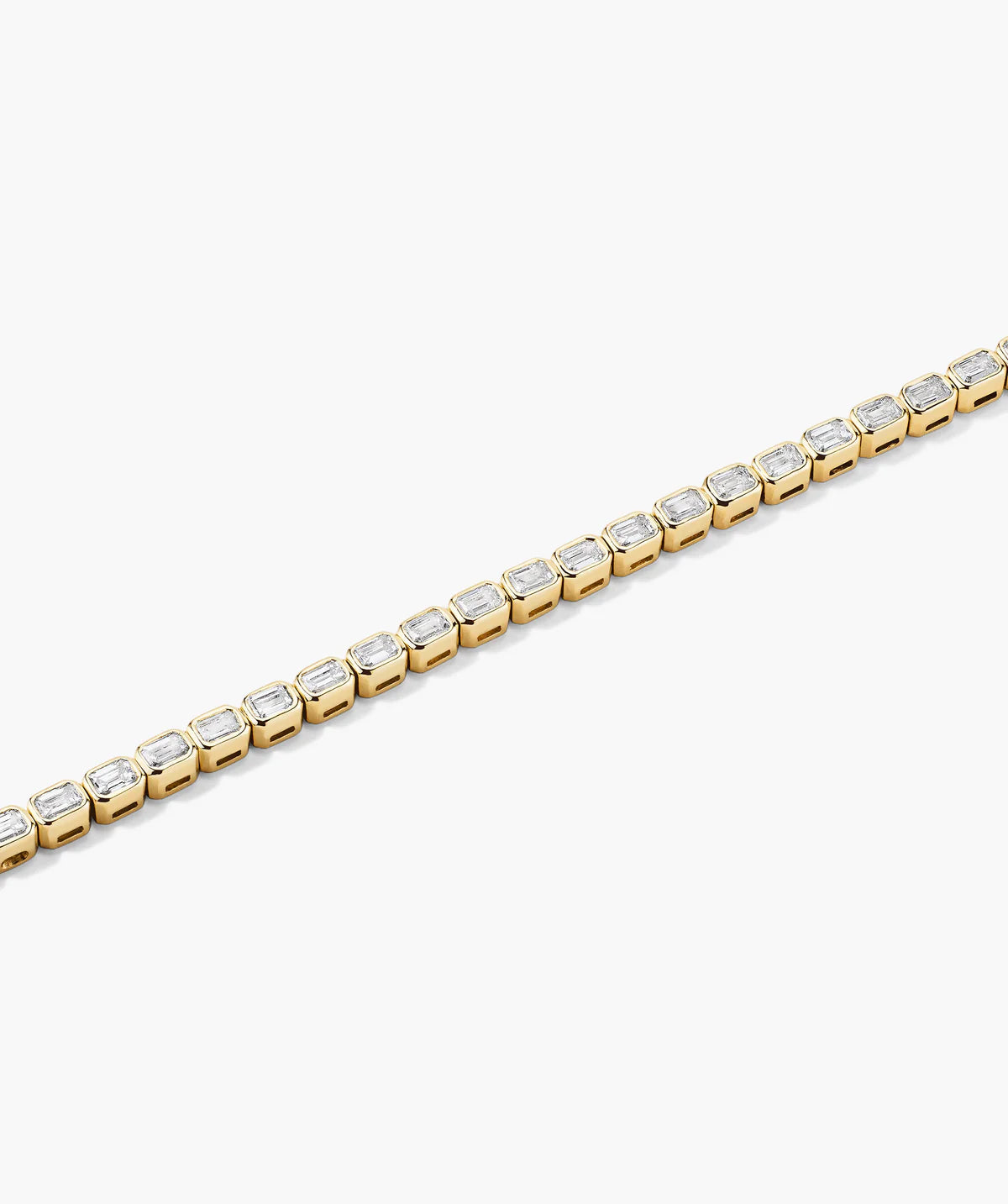Bezel Tennis Bracelet with Emerald cut