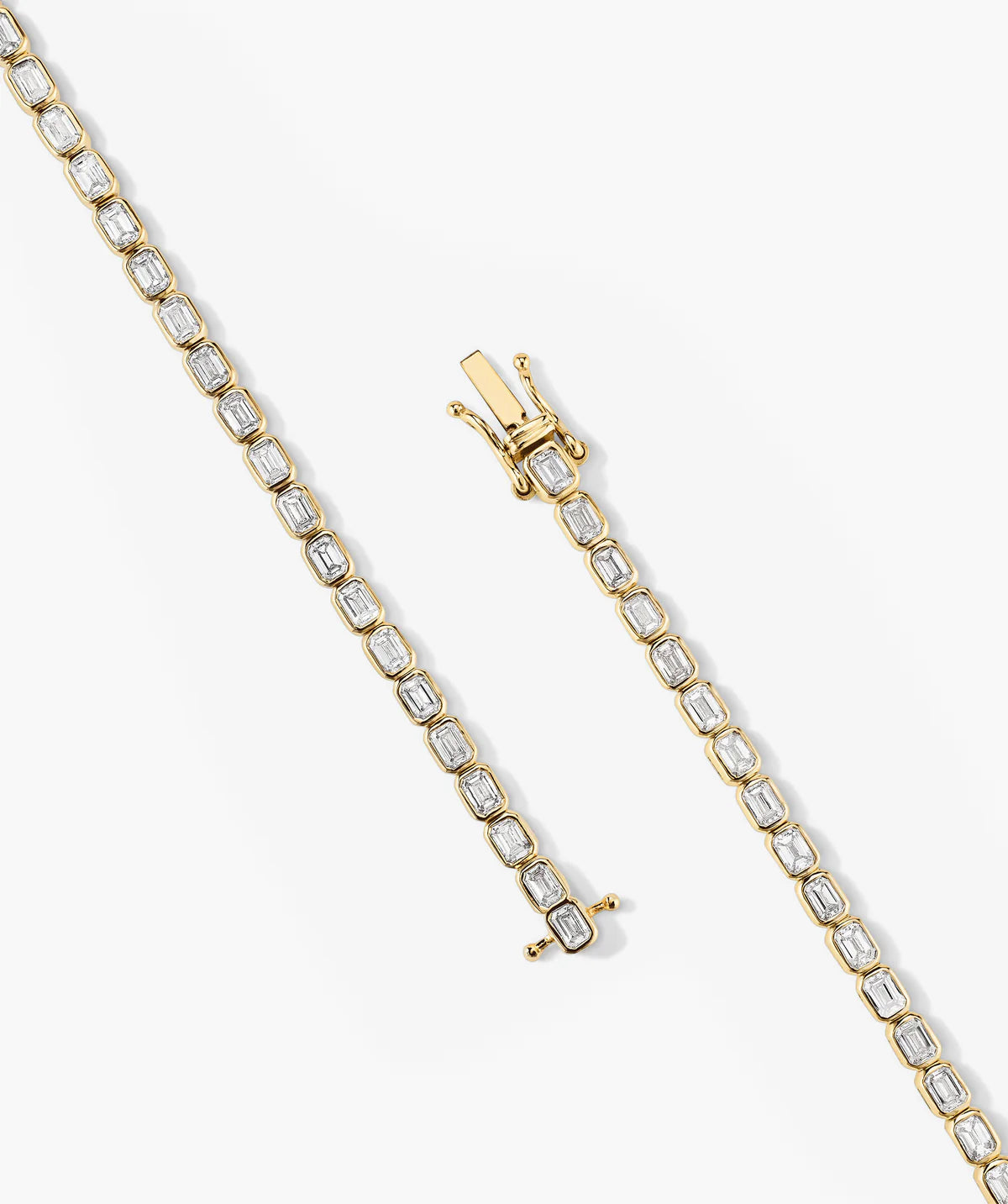 Bezel Tennis Bracelet with Emerald cut