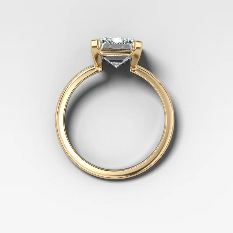 North South Half Bezel Solitaire Engagement Ring With Emerald Cut Diamond