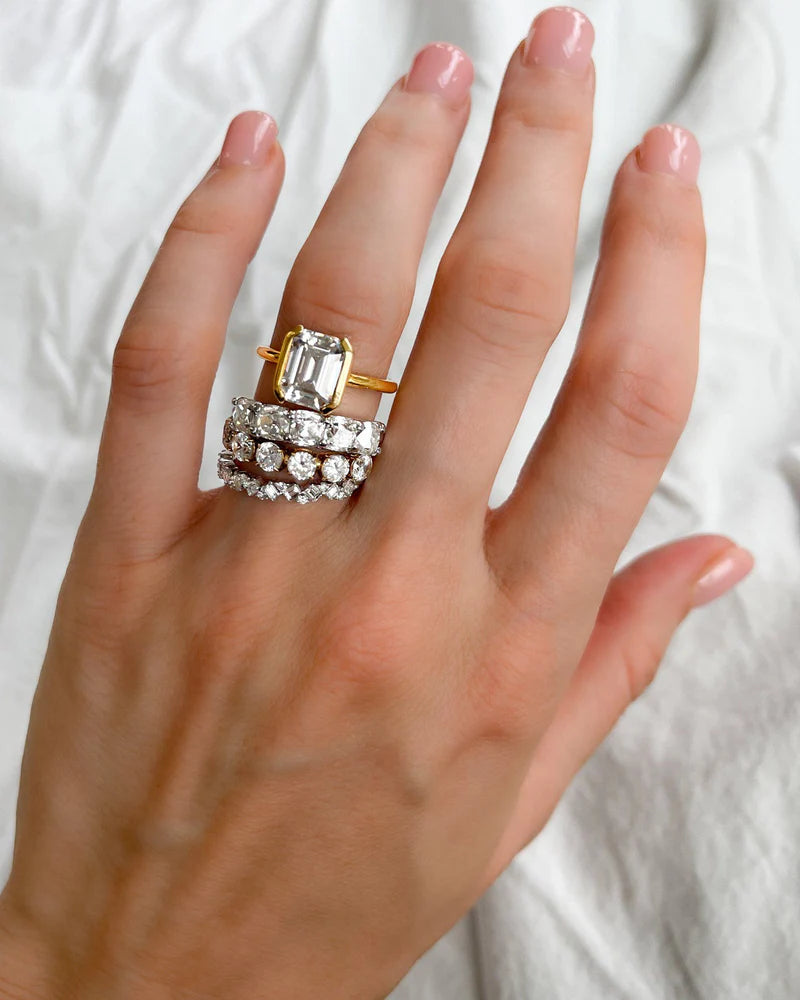 North South Half Bezel Solitaire Engagement Ring With Emerald Cut Diamond