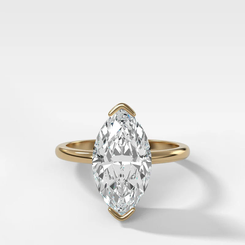 North South Half Bezel Solitaire Engagement Ring With Marquise Cut Diamond