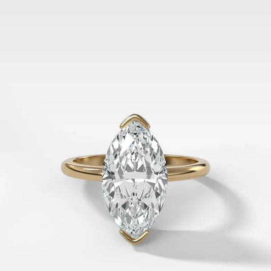 North South Half Bezel Solitaire Engagement Ring With Marquise Cut Diamond