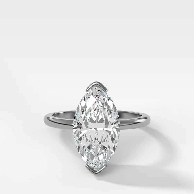 North South Half Bezel Solitaire Engagement Ring With Marquise Cut Diamond