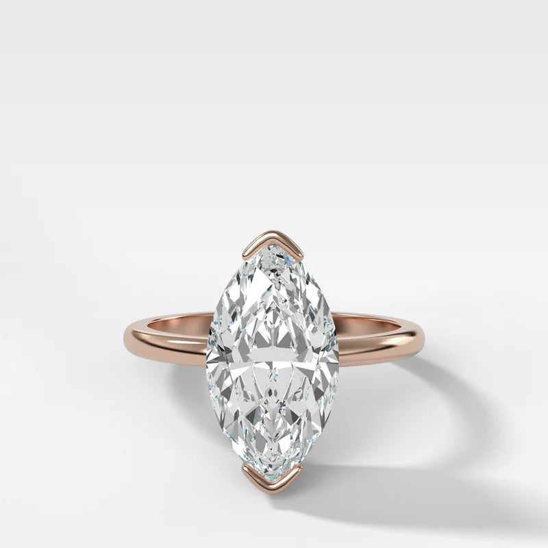 North South Half Bezel Solitaire Engagement Ring With Marquise Cut Diamond
