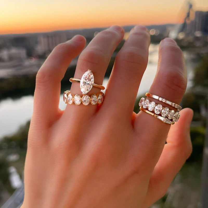 North South Half Bezel Solitaire Engagement Ring With Marquise Cut Diamond