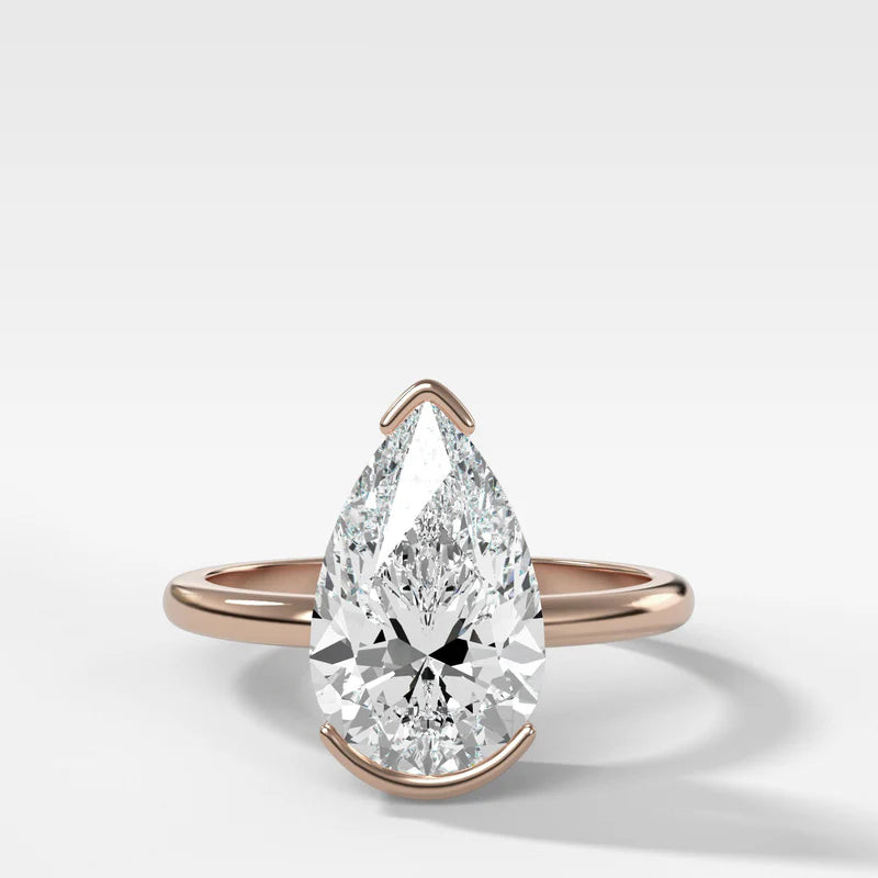 North South Half Bezel Solitaire Engagement Ring With Pear Cut Diamond