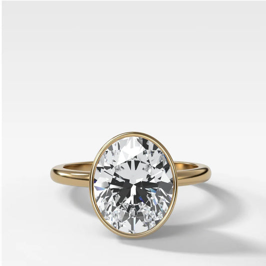 Penumbra Bezel Set Engagement Ring With Oval Cut