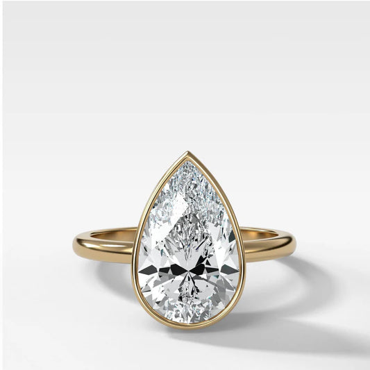 Penumbra Bezel Set Engagement Ring With Pear Cut