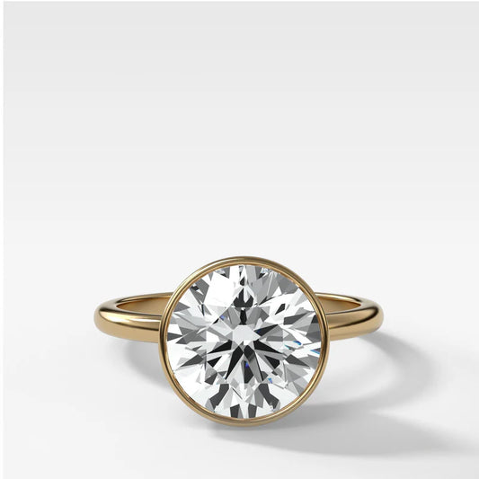 Penumbra Bezel Set Engagement Ring With Round Cut