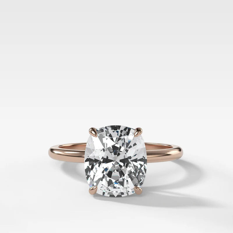 Thin + Simple Solitaire Engagement Ring With Elongated Cushion Cut Diamond