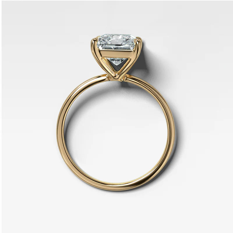 Thin + Simple Solitaire Engagement Ring With Elongated Radiant Cut Diamond