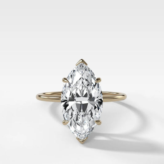 Thin + Simple Solitaire Engagement Ring With Marquise Cut Diamond