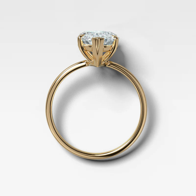 Thin + Simple Solitaire Engagement Ring With Marquise Cut Diamond