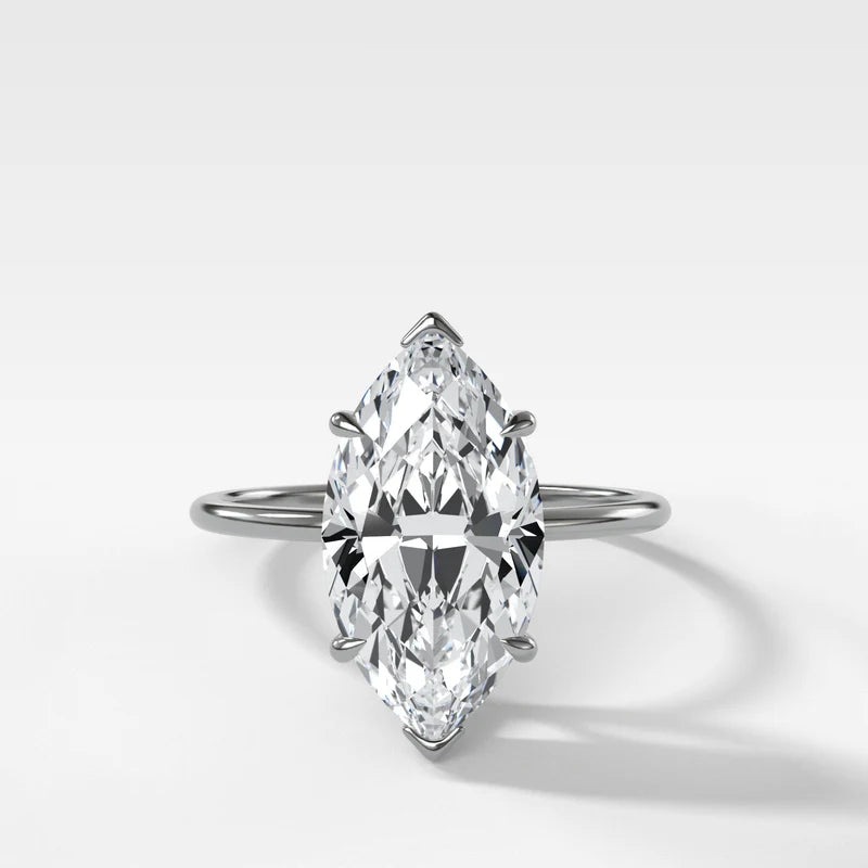 Thin + Simple Solitaire Engagement Ring With Marquise Cut Diamond