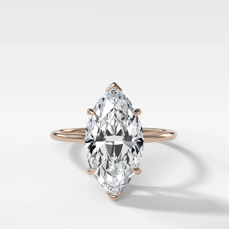 Thin + Simple Solitaire Engagement Ring With Marquise Cut Diamond