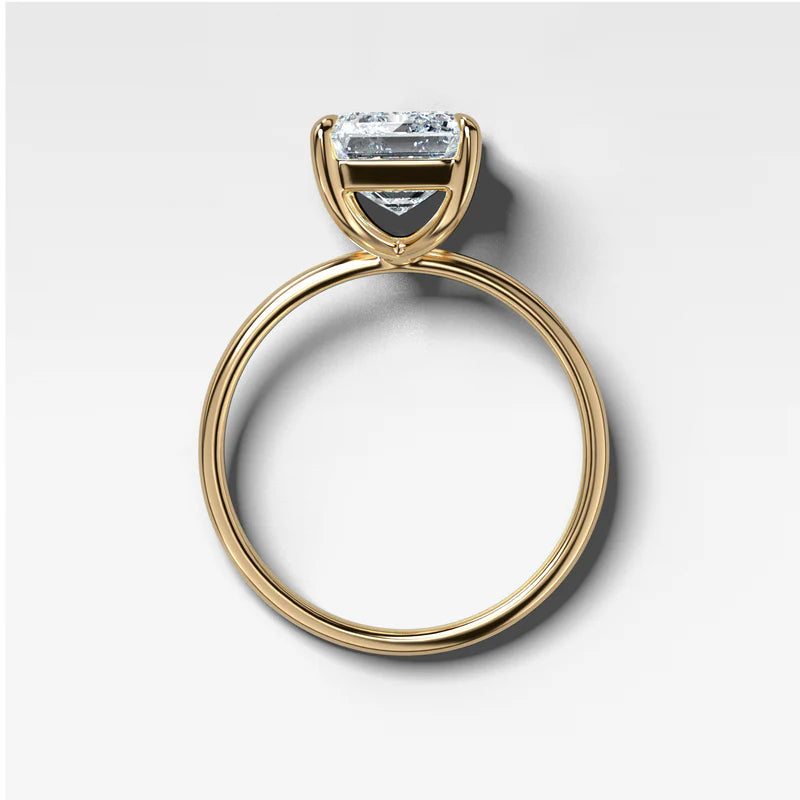 Thin + Simple Solitaire Engagement Ring With North South Emerald Cut Diamond
