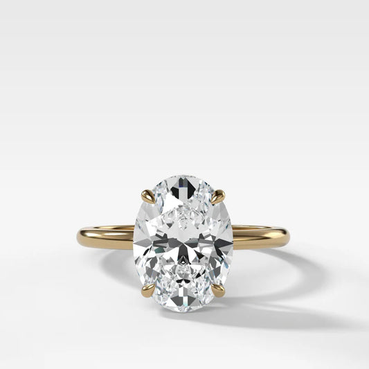 Thin + Simple Solitaire Engagement Ring With Oval Cut Diamond