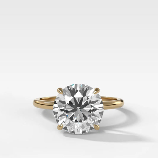 Thin + Simple Solitaire Engagement Ring With Round Brilliant Cut Diamond