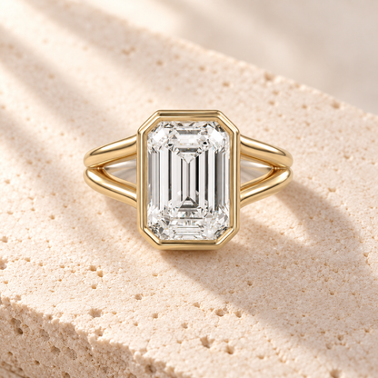 Aperture Emerald Split-Shank Ring in yellow gold, top view — AI design preview