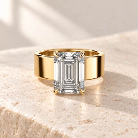 Forma Emerald Cigar-Band Ring in yellow gold, front view — AI design preview