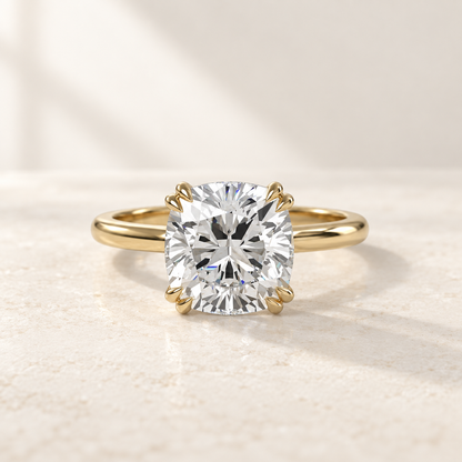 AI product preview of Altara Cushion Cathedral Solitaire Ring in yellow gold, front view