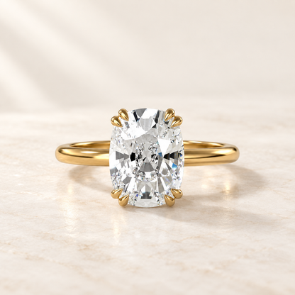 AI product preview of Altara Elongated Cushion Cathedral Ring in yellow gold, front view
