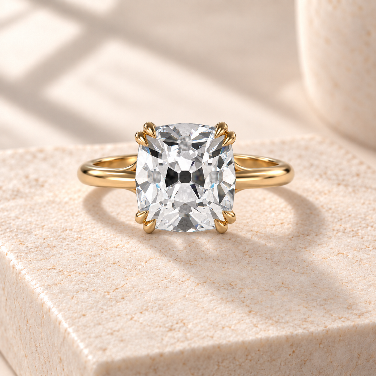 Altara Old Mine Cathedral Ring in yellow gold on cream stone, front view