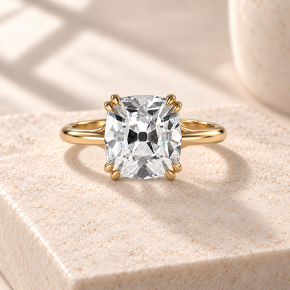 Altara Old Mine Cathedral Ring in yellow gold on cream stone, front view