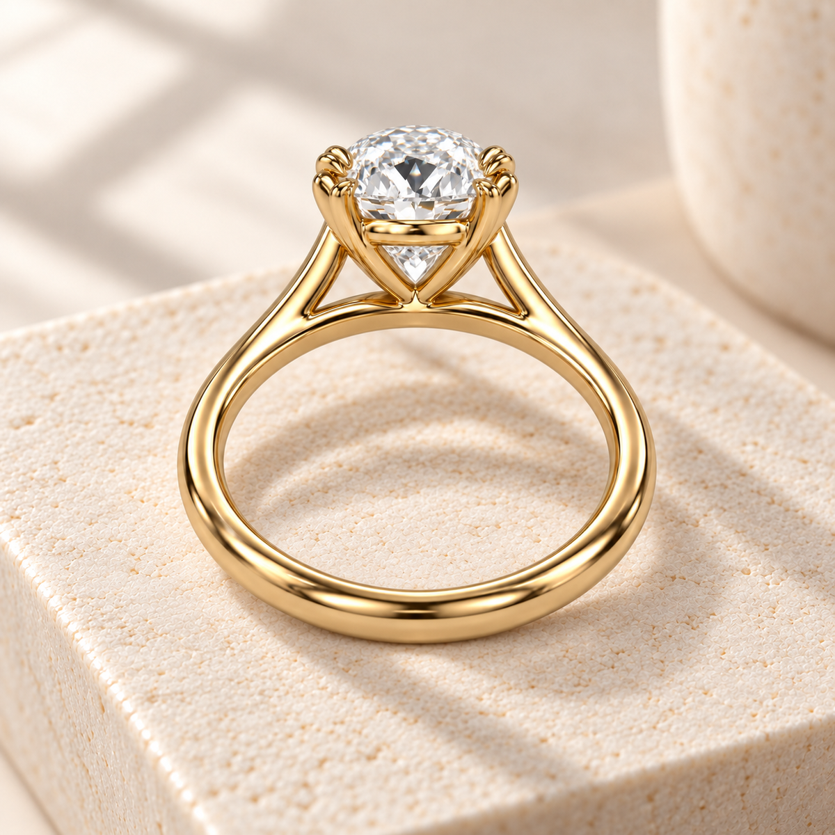Altara Oval Cathedral Ring in yellow gold on cream stone, rear view