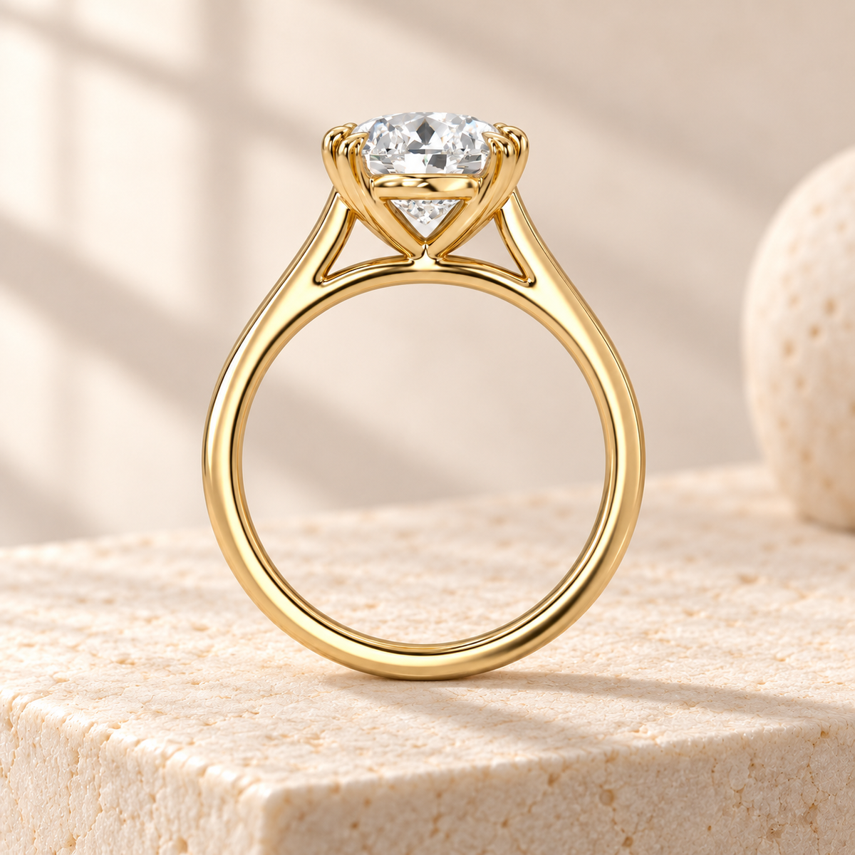 Altara Oval Cathedral Ring in yellow gold on cream stone, side view