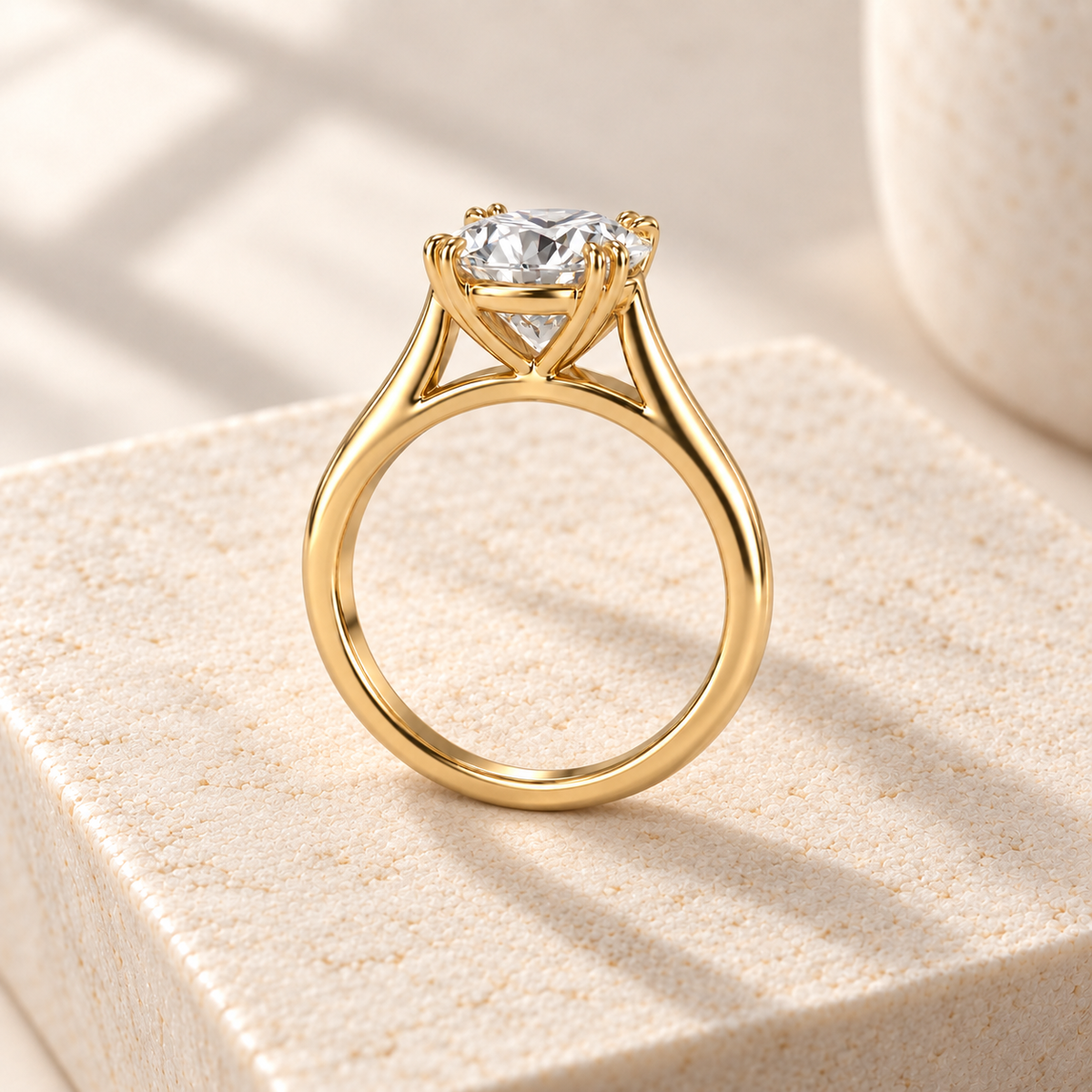 Altara Round Cathedral Ring in yellow gold on cream stone, rear view