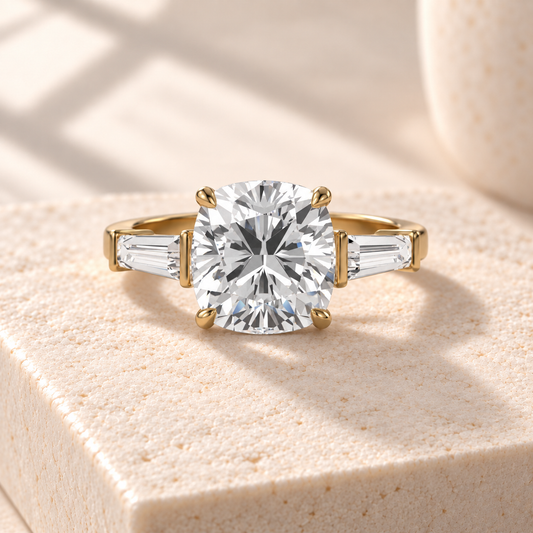 Aster Cushion Tapered Baguette Ring, front design preview in yellow gold on cream stone